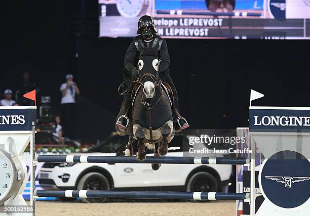 Penelope Leprevost of France rides as Darth Vader during the 'Style and Competition' show jumping charity event benefitting 'AMADE' on day three of...