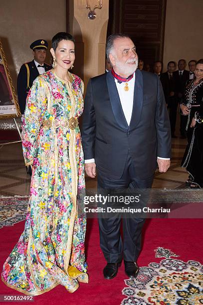 Morocco's Princess Lalla Meryem gives royal medal to Francis Ford Coppola during the 15th Marrakech International Film Festival on December 5, 2015...