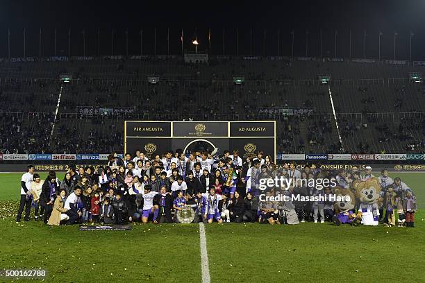 Players and family of Sanfrecce Hiroshima pose for photograph. Sanfrecce Hiroshima won the J.League 2015 after the J.League 2015 Championship final...