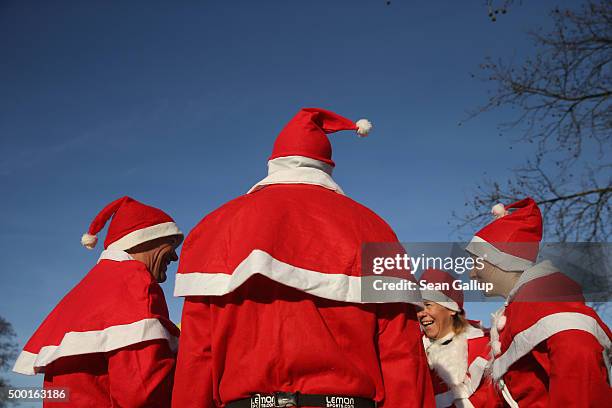 Participants dressed as Santa Claus wait to start in the 7th annual Michendorf Santa Run on December 6, 2015 in Michendorf, Germany. A record 900...