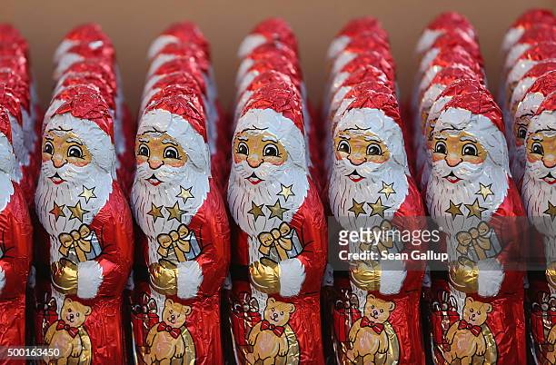 Chocolate figurines in the form of St. Nicholas, or Santa Claus, stand in rows before they were given to participants in the 7th annual Michendorf...