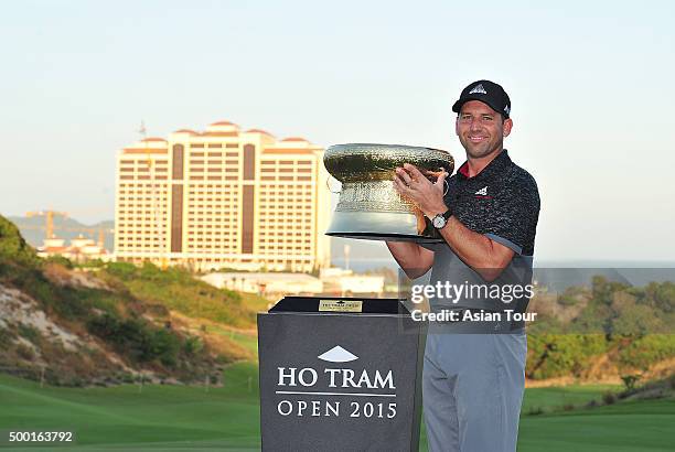 Sergio Garcia of Spain poses with the Ho Tram trophy after he won during round four of the Ho Tram Open at The Bluffs Ho Tram Strip on December 6,...