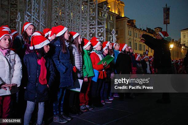 Christmas choir of children inaugurated the lighting of Christmas Tree in Piazza Castello and the opening of the first two windows of the advent...