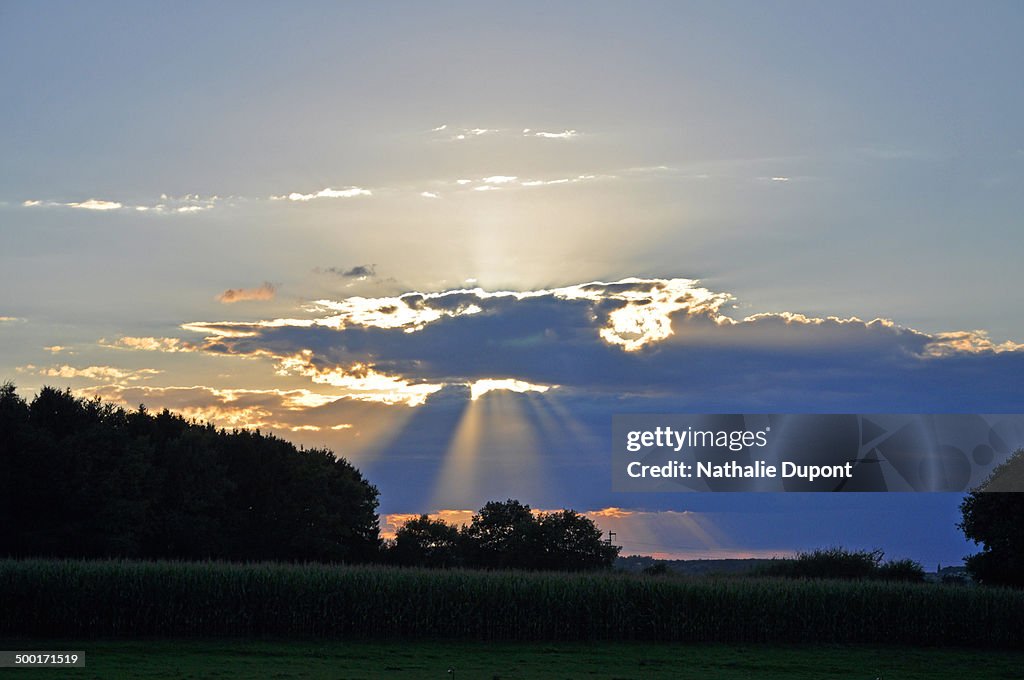 Sun behind the clouds