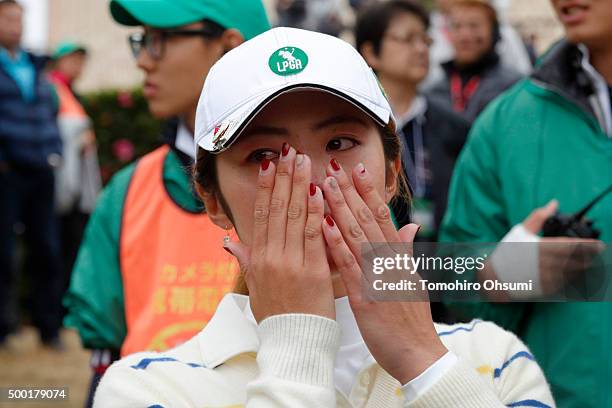 Ayaka Watanabe of the Ladies Professional Golf Association of Japan team cries after winning THE QUEENS Presented By KOWA at the Miyoshi Country Club...