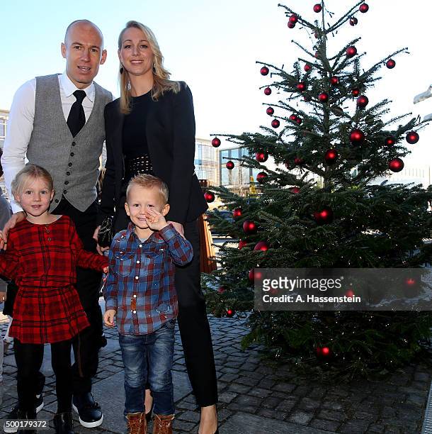 Arjen Robben of FC Bayern Muenchen arrives with his wife Bernadien Robben for the FC Bayern Muenchen Christmas Party at Alfons Schuhbeck`s...
