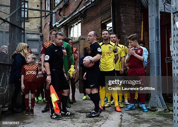 The Players and Referee wait to walk out prior to The Emirates FA Cup Second Round match between Bradford City and Chesham United at Coral Windows...