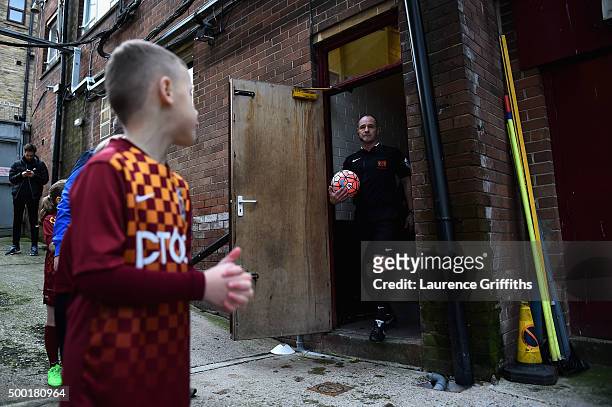 Young mascot watches the Referee walk out for the Emirates FA Cup Second Round match between Bradford City and Chesham United at Coral Windows...