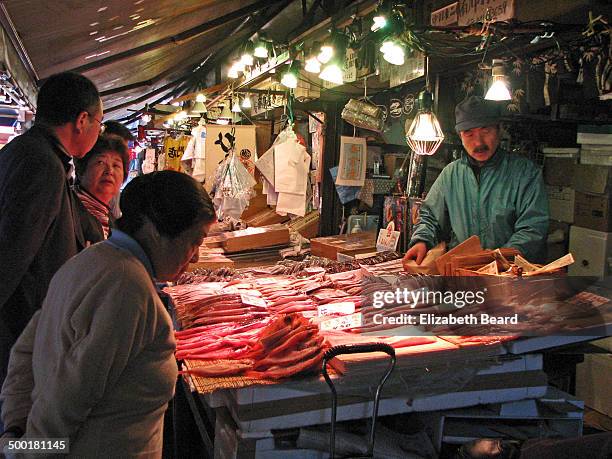 Shoppers consider their options at the Tsukiji Outer Market.