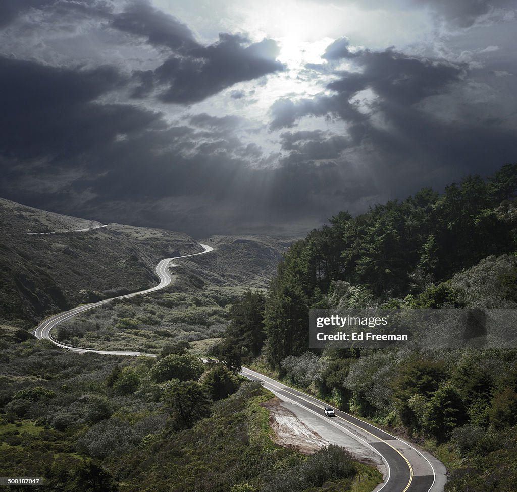 Dramatic Sky and Winding Road
