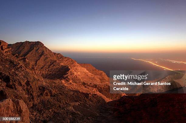 magical hour at jabel hafeet - jebel hafeet stock pictures, royalty-free photos & images