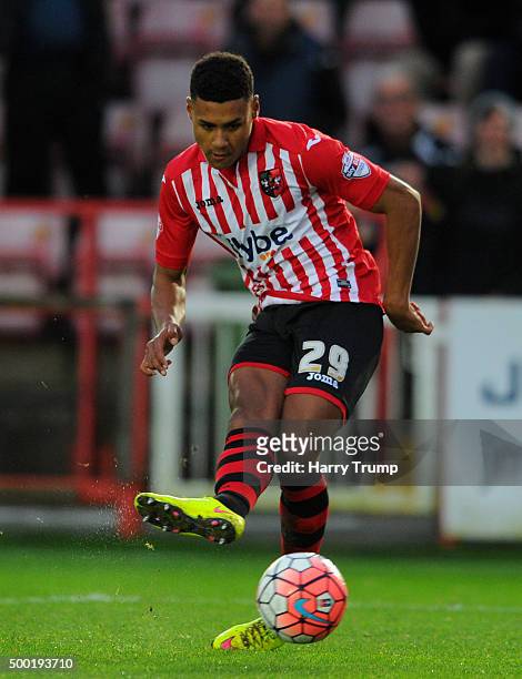 Ollie Watkins of Exeter City scores his sides second goal during the Emirates FA Cup Second Round match between Exeter City and Port Vale at St James...
