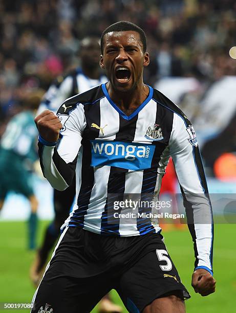 Georginio Wijnaldum of Newcastle United celebrates as his cross deflects off Martin Skrtel of Liverpool for their first goal during the Barclays...