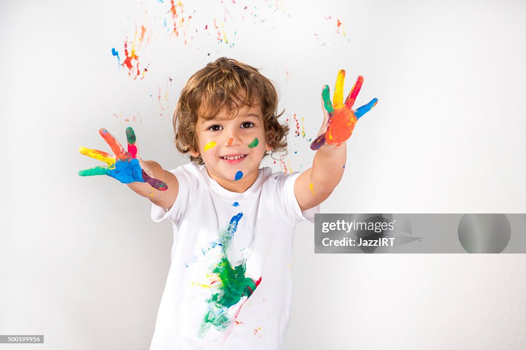 Boy Showing Colorful Paint on His Hands