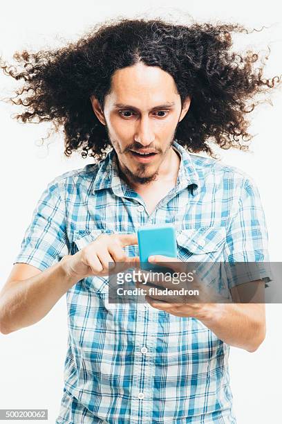 fast internet - tousled hair man stock pictures, royalty-free photos & images