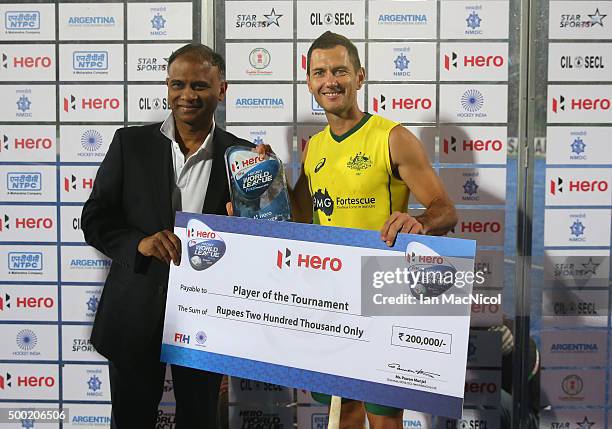 Jamie Dwyer of Australia receives his player of the tournament award after winning the final between Australia and Belgium on day ten of The Hero...