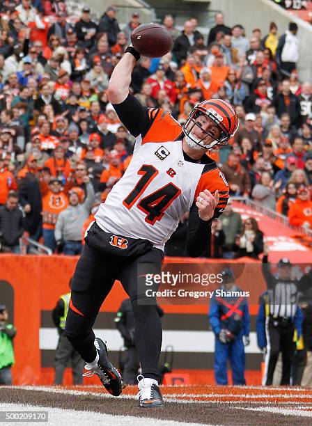Andy Dalton of the Cincinnati Bengals celebrates a first quarter touchdown while playing the Cleveland Browns at FirstEnergy Stadium on December 6,...