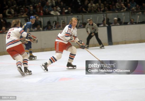 Gene Carr of the New York Rangers skates on the ice during an NHL game against the St. Louis Blues circa 1972 at the Madison Square Garden in New...