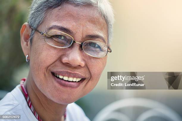 portrait of a happy woman - beautiful filipina woman stock pictures, royalty-free photos & images