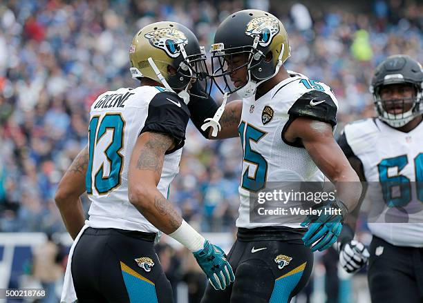 Rashad Greene and Allen Robinson of the Jacksonville Jaguars celebrate after scoring a touchdown against the Tennessee Titans during the game at...