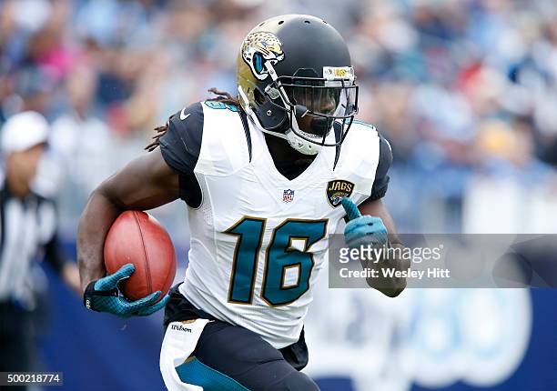 Denard Robinson of the Jacksonville Jaguars runs with the ball during the game against the Tennessee Titans at Nissan Stadium on December 6, 2015 in...