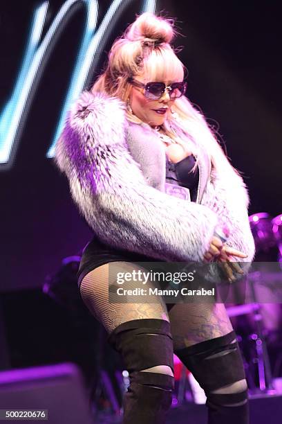 Lil Kim performs at The Conglomerate and Hot 97 Present "Busta Rhymes and Friends: Hot For The Holiday" concert at Prudential Center on December 5,...