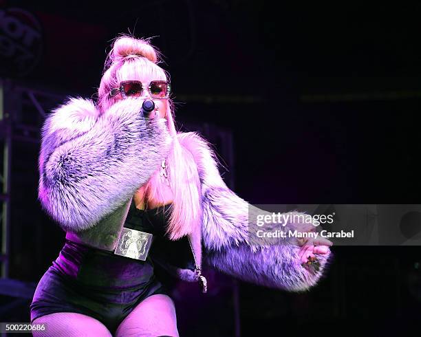 Lil Kim performs at The Conglomerate and Hot 97 Present "Busta Rhymes and Friends: Hot For The Holiday" concert at Prudential Center on December 5,...