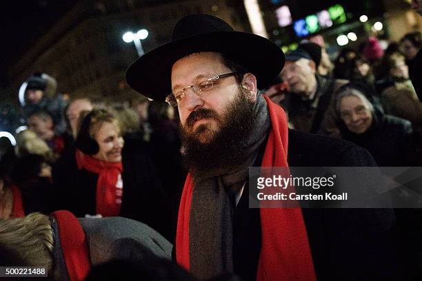 Rabbi Yehuda Teichtal attends the ceremony of the Hanukkah menorah lighting at a public Menorah ceremony near the Brandenburg Gate on December 6,...