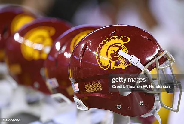 Detailed view of USC Trojans football helmets sitting on the bench against the Stanford Cardinal during the third quarter of the NCAA Pac-12...