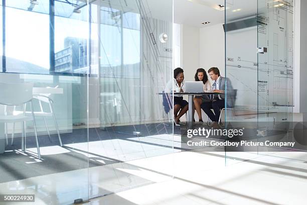 getting down to business - business meeting three people stock pictures, royalty-free photos & images