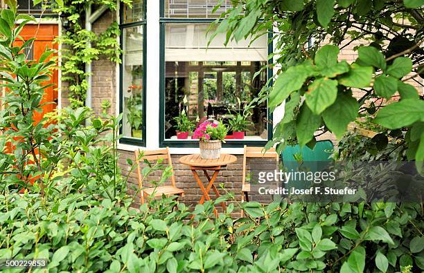 Front yard with chairs and table in Delft, Holland