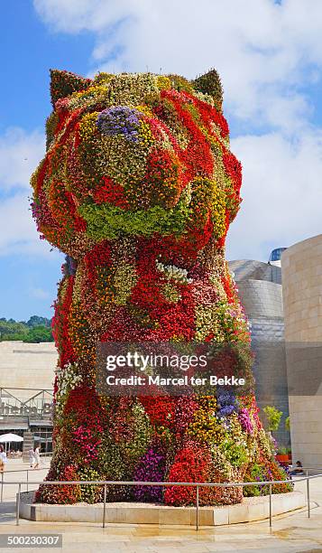 Giant puppy dog made of flowers, by Jeff Koons at Guggenheim Bilbao, Spain