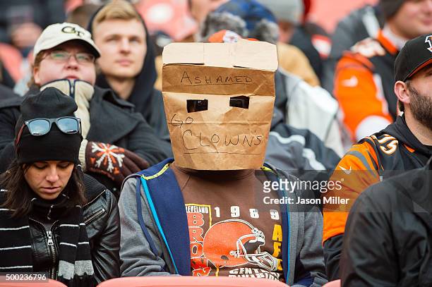 Cleveland Browns fan expresses their disappointment with the team during the second half against the Cincinnati Bengals at FirstEnergy Stadium on...