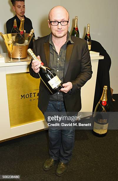 Director Lenny Abrahamson poses with the Best International Independent Film award for "Room" at the Moet British Independent Film Awards 2015 at Old...