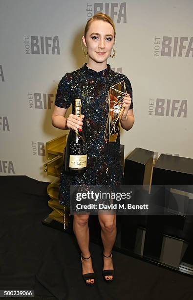 Saoirse Ronan, winner of the Best Actress award for "Brooklyn", poses at the Moet British Independent Film Awards 2015 at Old Billingsgate Market on...