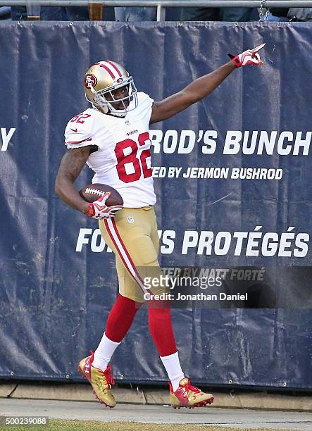 Torrey Smith of the San Francisco 49ers celebrates scoring the winning touchdown against the Chicago Bears at Soldier Field on December 6, 2015 in...