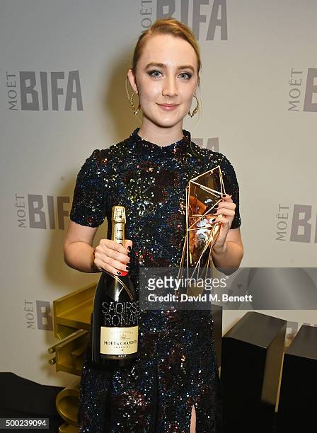 Saoirse Ronan, winner of the Best Actress award for "Brooklyn", poses at the Moet British Independent Film Awards 2015 at Old Billingsgate Market on...