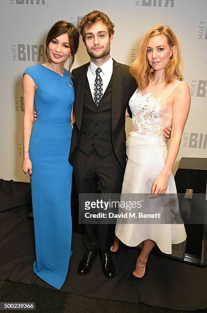 Presenters Gemma Chan, Douglas Booth and Vanessa Kirby pose at the Moet British Independent Film Awards 2015 at Old Billingsgate Market on December...