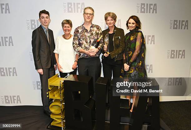 Presenters Matthew Beard and Tuppence Middleton pose with winners of the Best Documentary award for "Dark Horse: The Incredible True Story Of Dream...