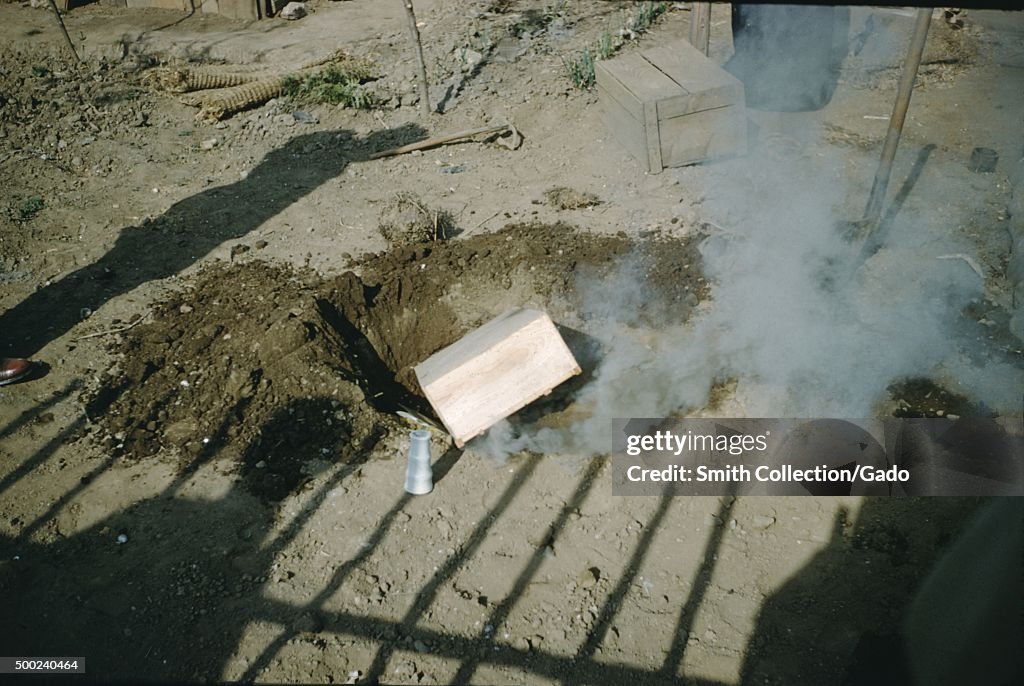 Smoking Wooden Box, In A Pit