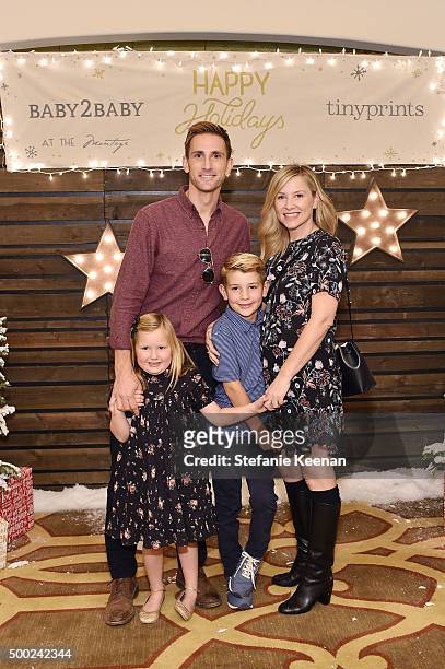 Christopher Gavigan, actress Jessica Capshaw and children attend the Baby2Baby Holiday Party Presented By Tiny Prints At Montage Beverly Hills on...
