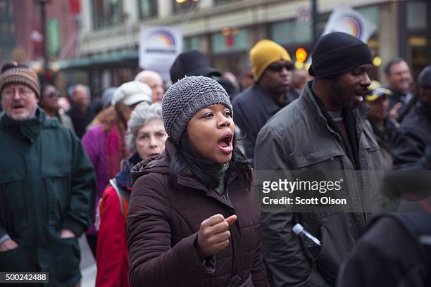 Demonstrators led by Rev. Jesse Jackson march down State Street to protest the death of Laquan McDonald and the alleged cover-up that followed on...