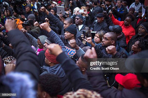 Demonstrators rally at the Thompson Center following a march through downtown to protest the death of Laquan McDonald and the alleged cover-up that...