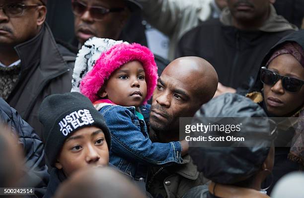Demonstrators rally at the Thompson Center following a march through downtown to protest the death of Laquan McDonald and the alleged cover-up that...