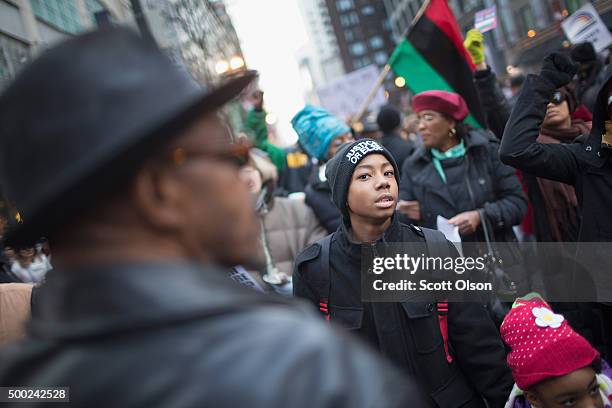 Demonstrators led by Rev. Jesse Jackson march down State Street to protest the death of Laquan McDonald and the alleged cover-up that followed on...