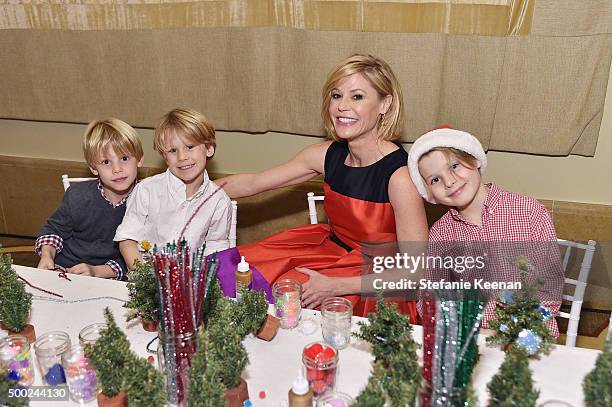 Actress Julie Bowen and sons attend the Baby2Baby Holiday Party Presented By Tiny Prints At Montage Beverly Hills on December 6, 2015 in Beverly...