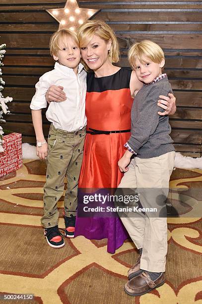 Actress Julie Bowen and sons attend the Baby2Baby Holiday Party Presented By Tiny Prints At Montage Beverly Hills on December 6, 2015 in Beverly...