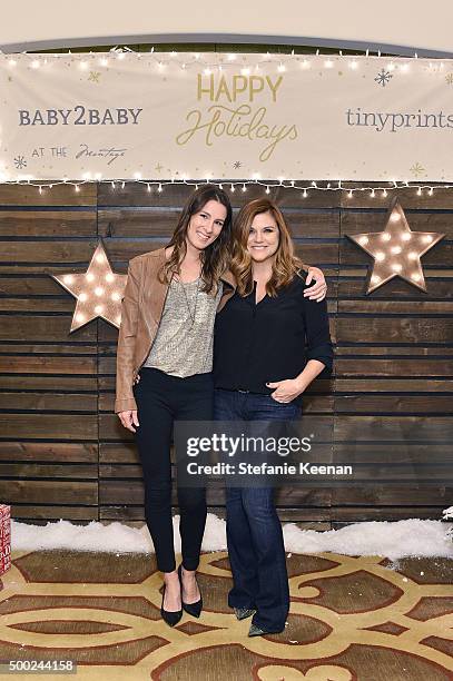 Jill Smith and actress Tiffani Amber Thiessen attend the Baby2Baby Holiday Party Presented By Tiny Prints At Montage Beverly Hills on December 6,...