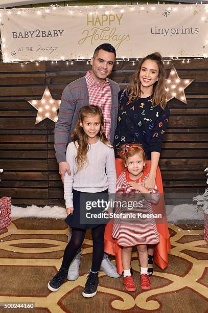 Cash Warren, actress Jessica Alba, Honor Marie Warren and Haven Garner Warren attend the Baby2Baby Holiday Party Presented By Tiny Prints At Montage...