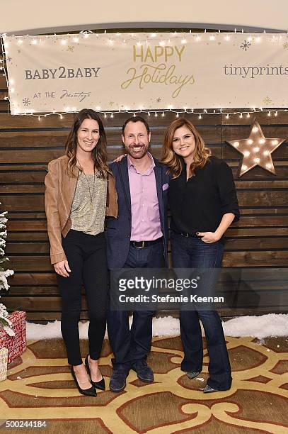 Jill Smith, CEO of Shutterfly Ink Jeffrey Housenbold and actress Tiffani Amber Thiessen attend the Baby2Baby Holiday Party Presented By Tiny Prints...